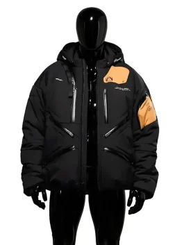 Death Stranding 2 Jacket in black with orange patch – front view on black mannequin