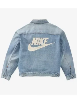 Blue denim jacket with large white Nike logo on the back.