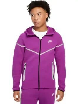 Front side of purple men’s Nike Tech fleece reflective Windrunner full-zip jacket with white reflective stripes.