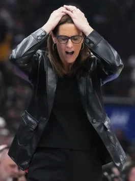 Stephanie White standing in black leather blazer.