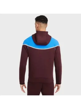 Back view of burgundy New Nike Tech reflective Windrunner tracksuit with blue shoulder panel.