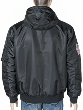 Full product display of the New York Yankees collaborative bomber jacket, highlighting its availability in black, green, and red.