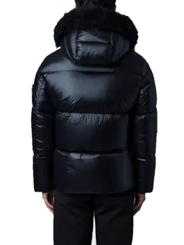 Back view of black Mackage coat puffer showing padded texture and fur-trimmed hood for cozy cold-weather wear.