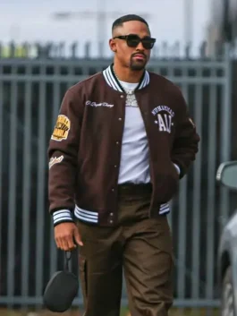 Jalen-Hurts-Wearing-Muhammad-Ali-Greatest-Of-All-Time-Brown-Bomber-Varsity-Jacket