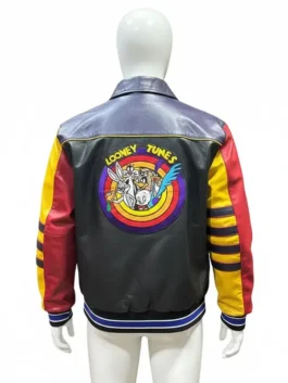 Back view of a vintage Jeff Hamilton Looney Tunes leather jacket featuring a large colorful patch of Bugs Bunny and friends in a rare bomber style.