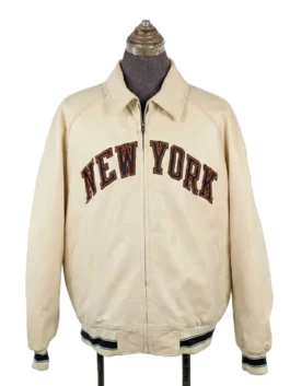 Front view of the Kith & Avirex for the New York Knicks Icon Jacket in cream leather, featuring embroidered 