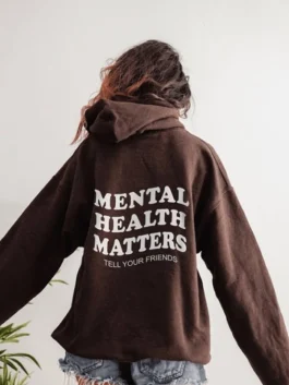 Back view of Mental Health Hoodie look with text