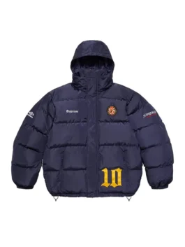 Full-frame front view of the navy blue Supreme Umbro Down Puffer Jacket with a hood. It features 'Supreme' on the chest, a patch emblem, an Umbro logo on the sleeve, and a large yellow '10' graphic.