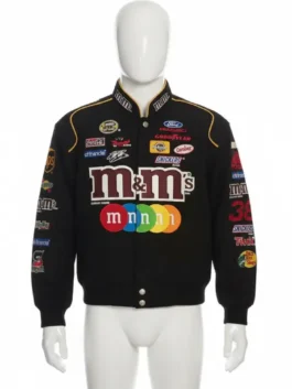 Vintage JH Design M&M NASCAR racing jacket, black with multi logos, on a white mannequin for product display.
