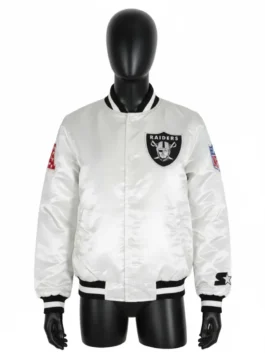 Full-front view of a mannequin wearing a white Raiders bomber jacket (similar to the one worn by Tom Brady) with the Raiders shield logo, NFL shield patch, and Starter logo.