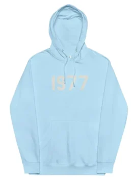 A light blue Fear of God Essentials hoodie with the large numbers