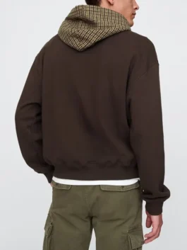 Rear view of a men's houndstooth Gap logo hoodie in brown, highlighting the checkered hood pattern.