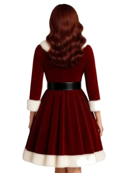 Back view of the fashionable Mrs. Claus Christmas Dress showing the deep red velvet fabric, 3/4 sleeves, and white Vegan-fur trim on the cuffs and skirt hem. The fitted bodice and flared skirt of this mrs. santa dress are separated by a wide black belt.