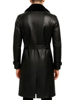 Back view of men’s black shearling leather jacket featuring belt and fur collar, premium long leather coat for winter 2025 style.