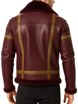 Back view of men’s maroon shearling leather jacket featuring brown detailing and soft fur lining, perfect for winter 2025 trends.