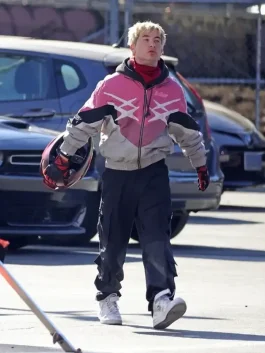Barry Keoghan pink biker track jacket from Crime 101 movie, combining biker and athletic style.