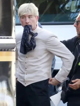 Close-up of Barry Keoghan wearing the Crime 101 costume jacket as a bellhop character from the film.