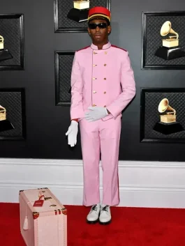 Halloween igor costume tyler the creator pink bellhop suit inspired by his Grammy red carpet look.