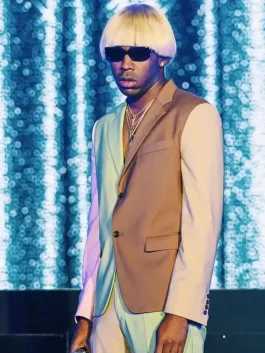 Igor outfit Tyler the Creator in his iconic Camp Flog Gnaw performance look with blonde wig and sunglasses.