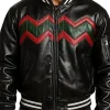 Men’s black and red reindeer leather jacket with green chevron design, stylish varsity-inspired outerwear for Christmas 2025