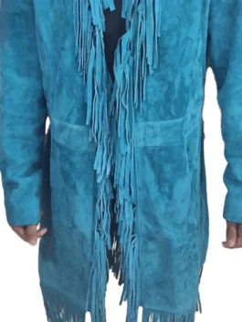 Mid-shot of the Reba McEntire turquoise fringe jacket The Voice S28 on a model, showcasing the teal color.