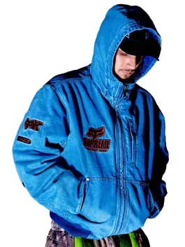 Front view of Supreme Fox Racing Denim Hooded Work Jacket in blue featuring Fox Factory Team embroidery and front zipper design.