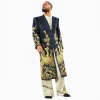 Seth Rollins modeling the Golden Peacock Long Coat, a navy black velvet outfit with gold embroidered peacock designs for WWE cosplay and collectors.