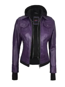 A slim-fit women's purple leather bomber jacket with a removable black zippered hood, dual chest flap pockets, and black ribbed knit cuffs and hem.