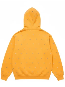Back view of the Mustard Yellow Stars Studded Hooded Sweatshirt. The entire back is covered in a pattern of small silver stud details.