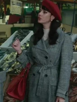 Kaya Scodelario Plaid Trench Coat trench coat and red beret, completing her stylish plaid coat look in a marketplace scene.