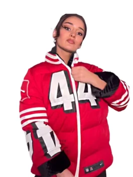 Kristin Juszczyk viral NFL puffer jacket moment. This Kyle Juszczyk wife custom red puffer jacket is a breakout design.