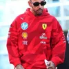A candid shot of the driver wearing the Lewis Hamilton F1 Las Vegas race hoodie, featuring a vibrant red colorway and sponsor logos perfect for the Las Vegas race weekend.