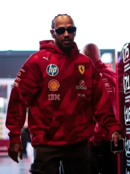 The F1 legend walking through the paddock wearing sunglasses and the Lewis Hamilton Formula 1 Las Vegas hoodie, highlighting the comfortable fit and Puma branding.