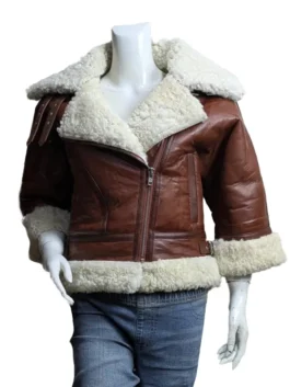 A unique brown leather aviator jacket with short sleeves and white shearling trim on the collar, cuffs, and hem, as seen on Sydney Sweeney.