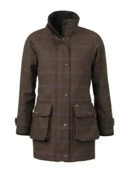Chanel Cresswell Jacket as Tammy Horniman in The Gentlemen wearing a country tweed jacket. Part of the The Gentlemen Netflix Tammy Horniman outfit.