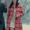 Kaya Scodelario as Susie Glass in her striking red and white plaid coat from The Gentlemen 2024 series, worn with a red beret.