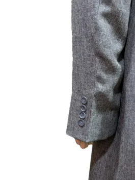Side view of the Theo James gray trench coat from The Gentlemen 2024 at America Jackets.
