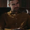 Theo James Brown Shirt Horniman in his brown button up shirt from The Gentlemen, showcasing a serious, thoughtful expression.