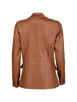 Back view of brown leather blazer showing center seam, shaped panels, and buttoned cuffs