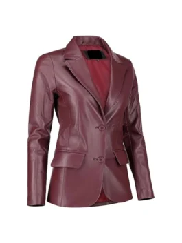 Angled view of burgundy leather blazer highlighting lapels, two-button closure, and pocket flaps