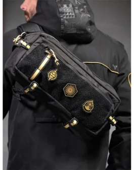 Back of a person wearing the Destiny 2 Salvation’s Edge raid jacket with a black and gold bag. Final Shape Raid Jacket.