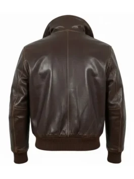 Back view of a classic dark brown leather bomber jacket featuring a vertical center seam, ribbed knit cuffs and hem, and a slightly popped collar.