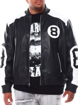 The front profile of a black and white leather 8-ball jacket with a heavy-duty zipper and bold sleeve decals.