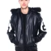 A sleek 8 Ball Real Leather Hooded Jacket in black with contrasting white circular decals and a built-in hood.