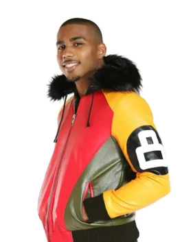 A stylish Tri Color 8 Ball Leather Jacket with a plush fur-trimmed hood and iconic red, yellow, and black leather panels.