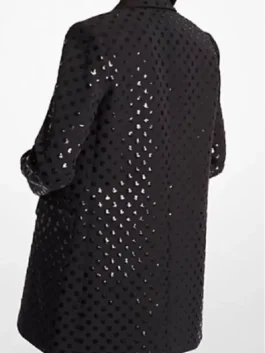 Back view of a black long sequin dot blazer with an all-over dotted sparkle pattern.