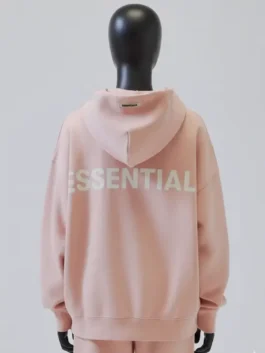 Back view of the Pacsun Essentials peach pullover hoodie on a black mannequin, an oversized hoodie with a subtle graphic.