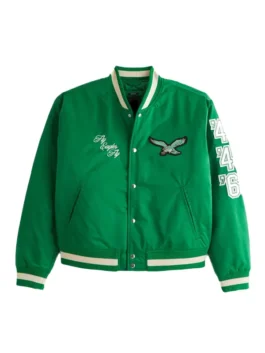 Front of a green Philadelphia Eagles varsity bomber jacket with an eagle patch, "Fly Eagles Fly" embroidery, and the numbers '46 on the left sleeve.