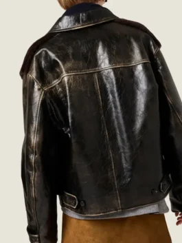 Rear view of the Sydney Sweeney black sherpa leather jacket showing the distressed texture; the ultimate leather blouson jacket shearling style.
