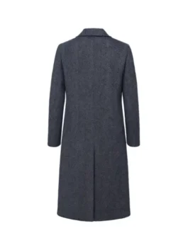 Back view of the Alexandra Breckenridge My Secret Santa Grey Wool Coat featuring a sleek herringbone pattern, tailored fit, and a classic central back vent.
